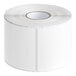 A roll of white semi-gloss paper with rectangular labels.