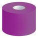 A roll of purple paper labels with white rectangular labels.