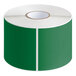 A roll of green and white rectangular Lavex inventory labels.