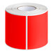 A roll of Lavex fluorescent red rectangular inventory labels with white stripes.