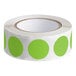 A roll of green circles on a white background.