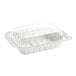 A white plastic Pactiv MealMaster chicken barn with a lid.