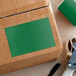 A cardboard box with a Lavex green rectangular label on it.