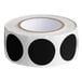 A roll of black circles with white background.