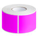 A roll of Lavex fluorescent pink rectangular inventory labels.