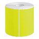 A roll of rectangular chartreuse Lavex labels.