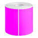 A roll of Lavex pink paper labels.