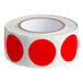 A roll of red semi-gloss paper labels with red polka dots.
