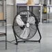 A black Boltic portable high-velocity floor fan with a metal frame.