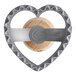 An Imperia heart-shaped metal ravioli cutter with a wooden handle.