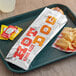 A tray with a Bagcraft king size foil hot dog bag containing a hot dog and chips.