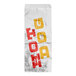 A Bagcraft white foil hot dog bag with red and yellow printed text that says "hot dog" and "hoo"