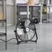 A Boltic black portable high-velocity floor fan with a metal frame.