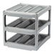 A stack of soft gray plastic Camshelving wine cradles.