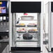 A Hatco Flav-R-Fresh hot food display cabinet on a countertop.