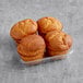 A tray of Katz Gluten-Free dinner rolls on a grey surface.