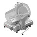 A Sirman automatic gravity feed meat slicer with a circular blade on a stand.