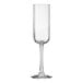 A clear wine glass with a stem.