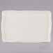 A white rectangular tray with a brown border.