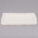 A white rectangular tray with a small handle.