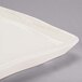 A white rectangular Libbey porcelain tray with a white rim.