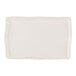 A rectangular cream porcelain tray or platter with slightly wavy edges.