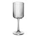 A close-up of a Libbey wine glass with a clear stem.