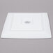 A white square Libbey porcelain plate.