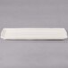 A white rectangular Libbey porcelain tray with a brown border.