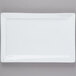 A white rectangular Libbey porcelain plate with a wide rim.