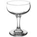 A clear Libbey Embassy Coupe Glass with a stem and base.