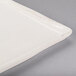 A white rectangular Libbey Farmhouse tray with a handle.
