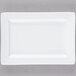 A white rectangular Libbey porcelain plate with a wide white rim.