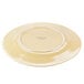 A Libbey round porcelain plate with a butter yellow center and wide white rim.