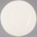 A Libbey round white porcelain plate with a wide rim.