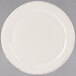 A white Libbey porcelain plate with a medium rim.