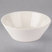 A white Libbey serving bowl with a rustic rim.