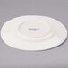 A white Libbey Farmhouse porcelain plate with a wide rim.