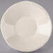 A white bowl with a brown rim.