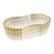 A stack of gold oval paper baking cups.
