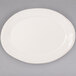 A white oval platter with a rim.