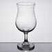 A Libbey Poco Grande glass on a table.