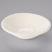 A white Libbey round porcelain fruit bowl with a rim.