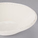 A white Libbey porcelain bowl with a rim.