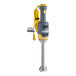 A Hamilton Beach hand blender with a yellow cord.