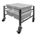 A stainless steel SSL Industries side-by-side tote cart with white bins on it.