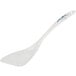 A white plastic spatula with a blue design on it.