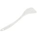 A white plastic spatula with a bamboo handle.