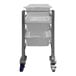A stainless steel cart with white trays on wheels.
