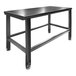 A stainless steel work table with black adjustable foot pads.